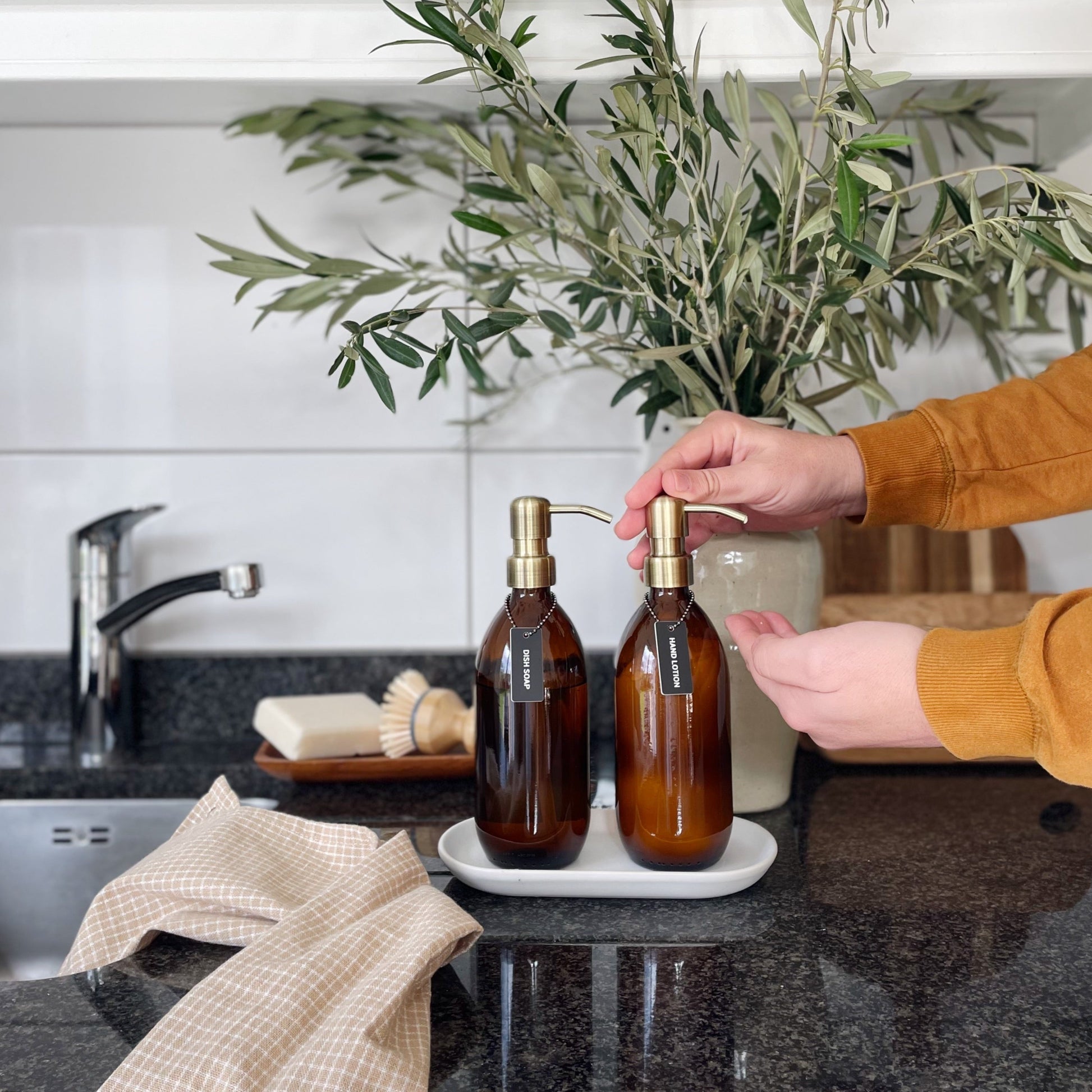 Amber Glass Dispenser Bottle with Bronze Pump - Amenities & Co.