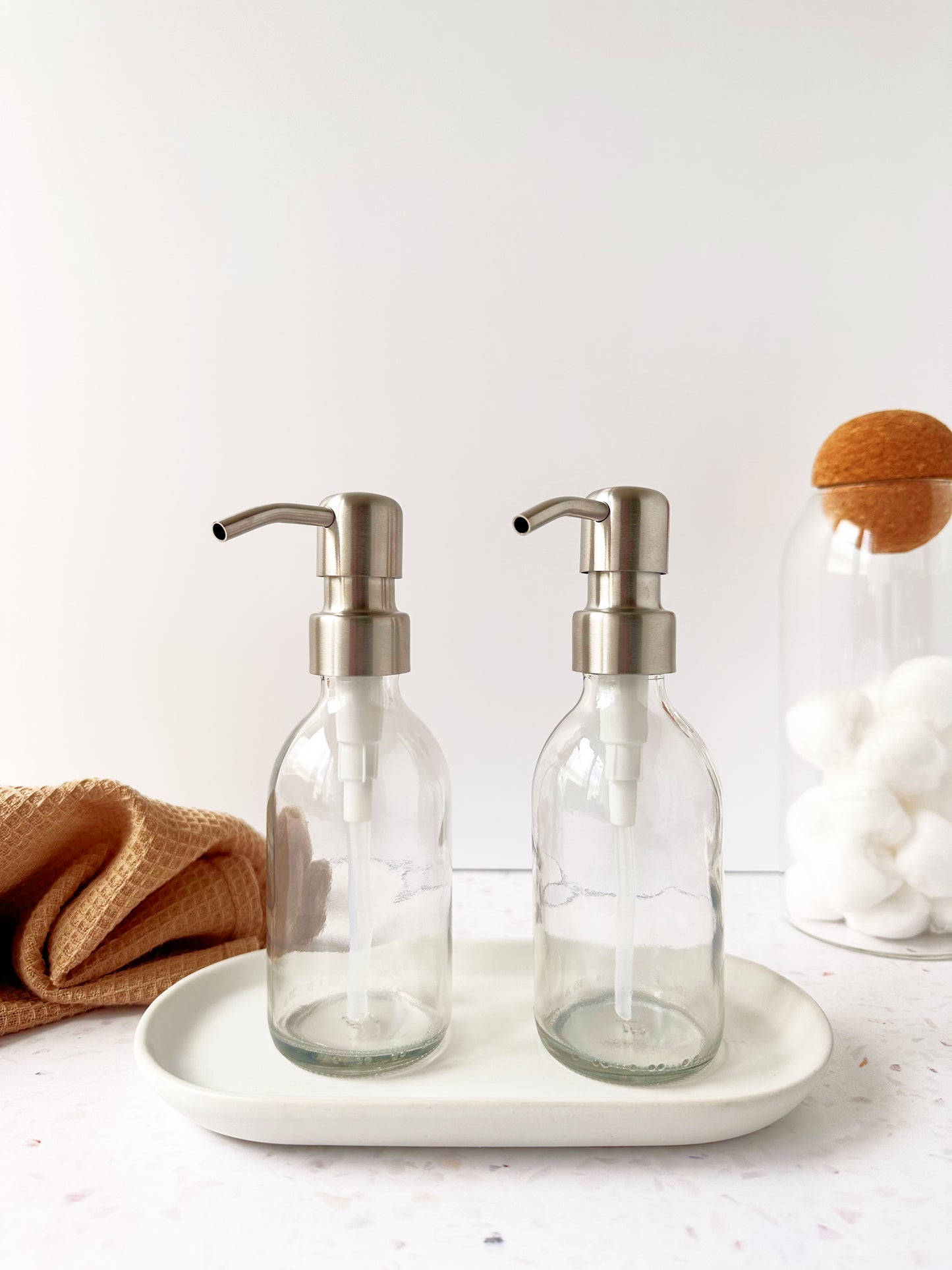 Clear Glass Dispenser Bottle with Silver Pump - Amenities & Co.