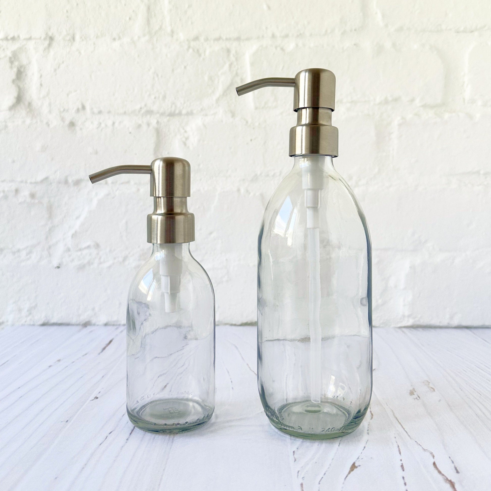 Clear Glass Dispenser Bottle with Silver Pump - Amenities & Co.